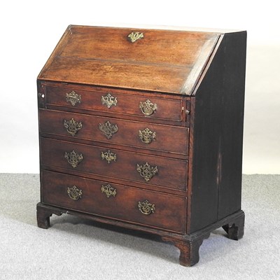 Lot 506 - A George III oak bureau