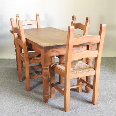 Lot 411 - A pine dining table
