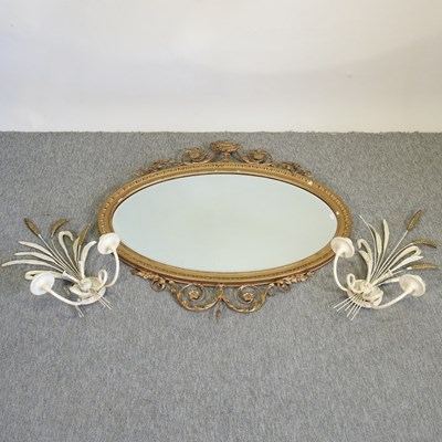 Lot 184 - A gilt framed oval wall mirror