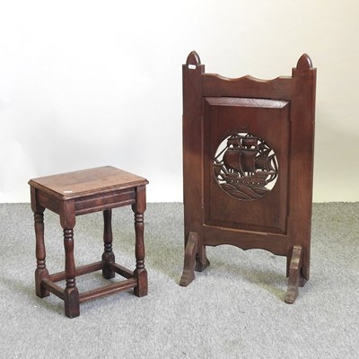 Lot 540 - An Arts and Crafts oak firescreen