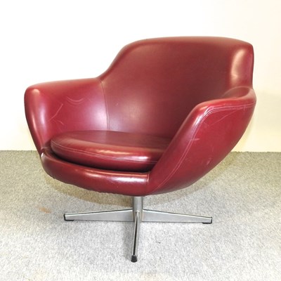 Lot 664 - A  1970's Danish red leather upholstered revolving armchair