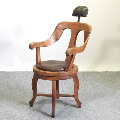 Lot 561 - A Victorian light oak barber's chair
