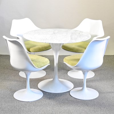 Lot 667 - A tulip shaped dining table with a marble top