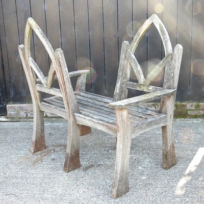 Lot 332 - A wooden garden bench/conversation seat