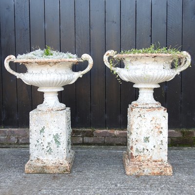 Lot 335 - A pair of large white painted cast iron garden urns