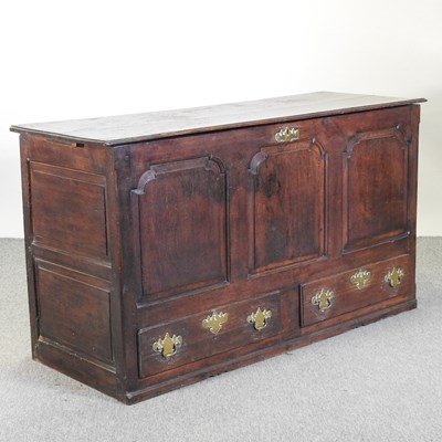 Lot 590 - An 18th century oak mule chest