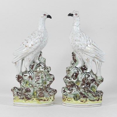 Lot 109 - A rare pair of 19th century Staffordshire pottery birds
