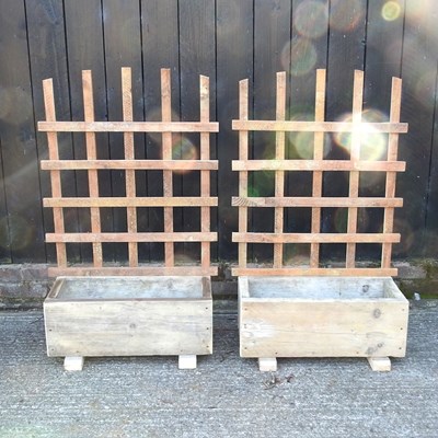 Lot 308 - A pair of small wooden garden planters with trellis