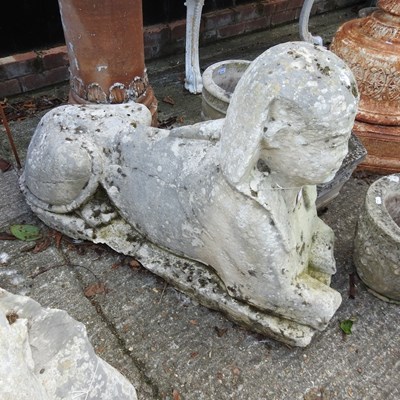 Lot 345 - A pair of 19th century carved stone sphinx