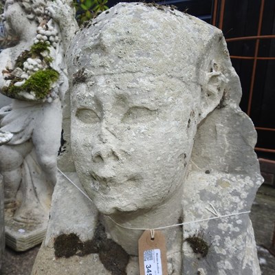 Lot 345 - A pair of 19th century carved stone sphinx