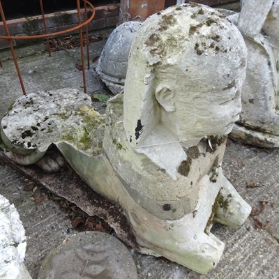 Lot 345 - A pair of 19th century carved stone sphinx