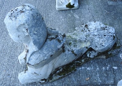 Lot 345 - A pair of 19th century carved stone sphinx