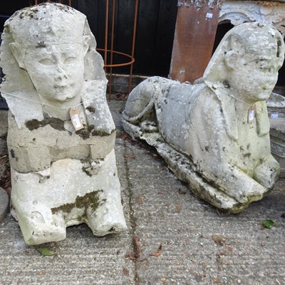 Lot 345 - A pair of 19th century carved stone sphinx