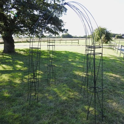 Lot 306 - A black painted metal rose arbour
