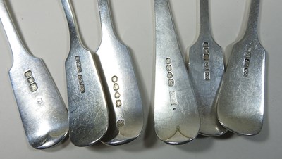 Lot 46 - A collection of George III bright cut silver table spoons