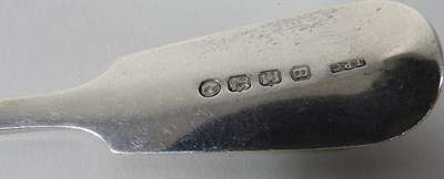 Lot 46 - A collection of George III bright cut silver table spoons