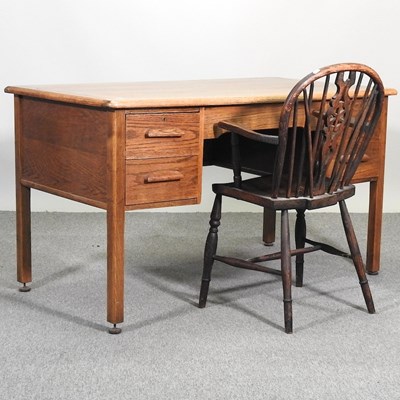 Lot 441 - A mid 20th century desk with chair