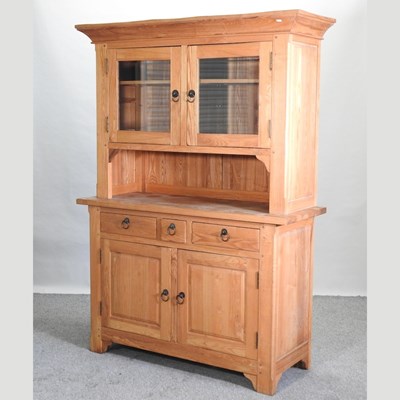 Lot 53 - A modern light oak dresser