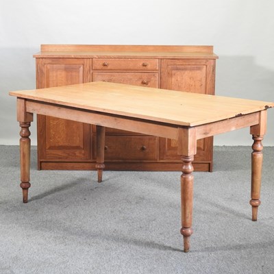 Lot 67 - A modern pine dining table