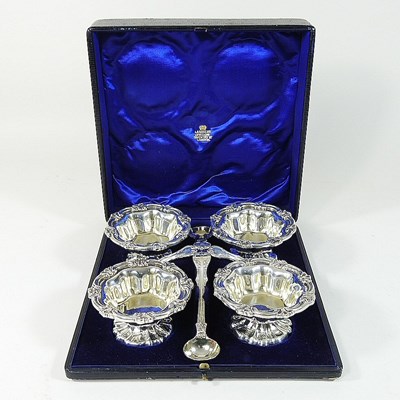 Lot 12 - An early 20th century silver four piece condiment set