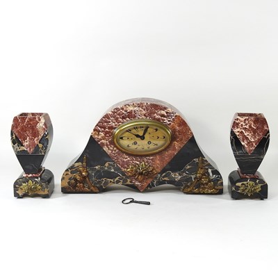 Lot 215 - An Art Deco clock garniture