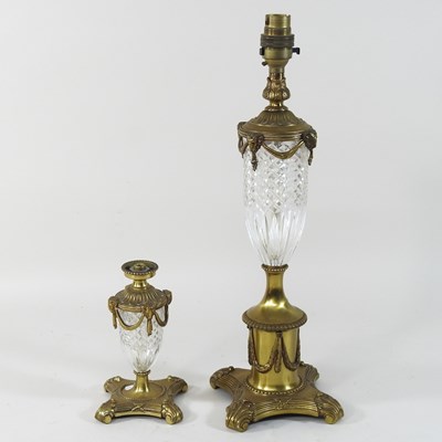 Lot 271 - An ornate early 20th century gilt metal and glass table lamp