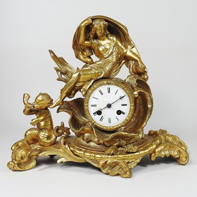 Lot 37 - A late 19th century gilt metal mantel clock