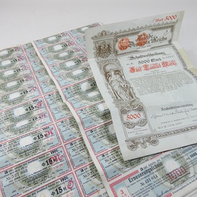 Lot 128 - A German 5000 Mark bond, together with collection of nineteen sheets of pre-World War II