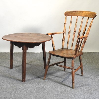 Lot 521 - An 18th century and later elm cricket table