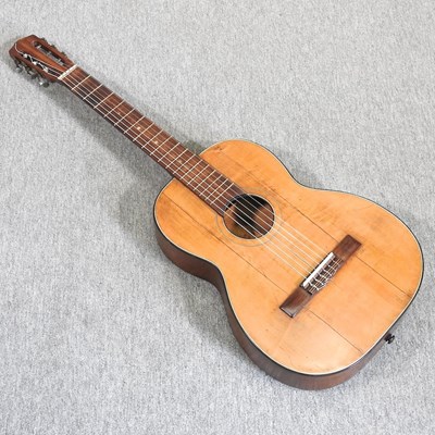 Lot 734 - An early 20th century acoustic guitar