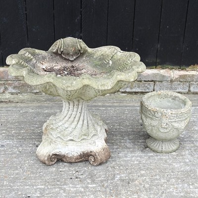 Lot 316 - A bird bath and pot