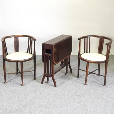 Lot 579 - A pair of chairs and a table