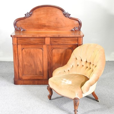 Lot 556 - A chiffonier and chair