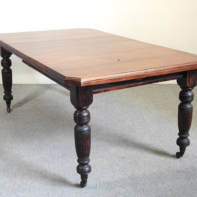 Lot 656 - A dining table