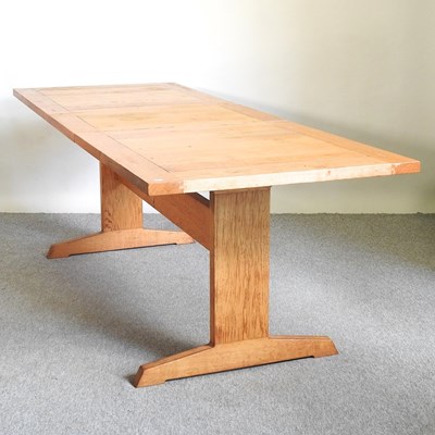 Lot 479 - An oak dining table