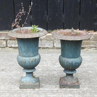 Lot 331 - A near pair of small garden urns