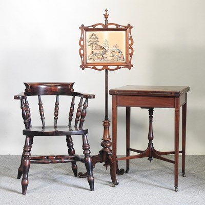 Lot 675 - An Edwardian mahogany envelope card table