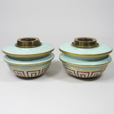 Lot 239 - A pair of oil lamp fonts