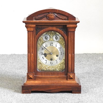 Lot 225 - An Edwardian walnut mantel clock