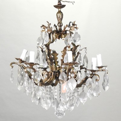 Lot 100 - A brass chandelier