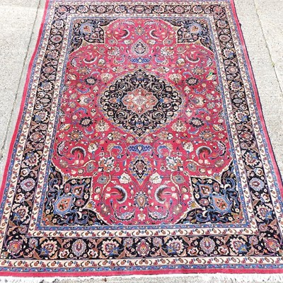 Lot 651 - A Persian woollen carpet
