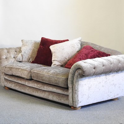 Lot 674 - A crushed velvet sofa