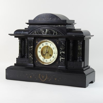 Lot 130 - A Victorian black slate mantel clock