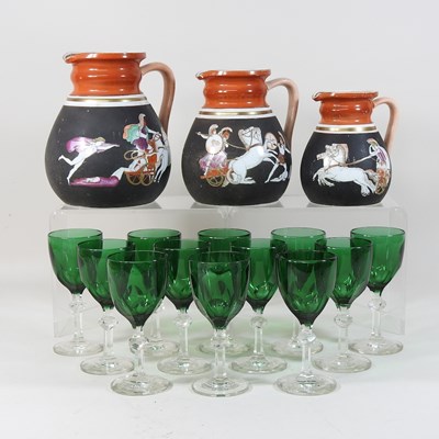 Lot 303 - A set of early 20th century green and cut glass sherry glasses