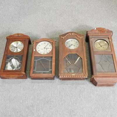 Lot 457 - A collection of four wall clocks