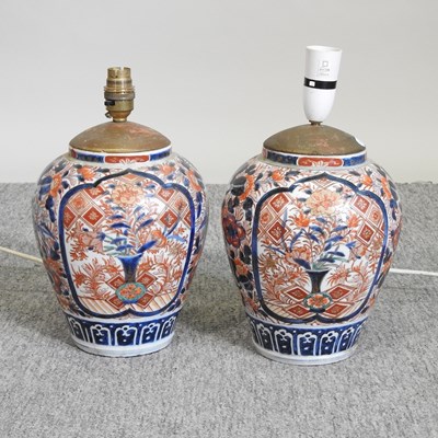 Lot 694 - A pair of table lamps