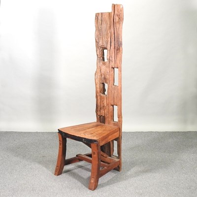 Lot 448 - A teak high back chair