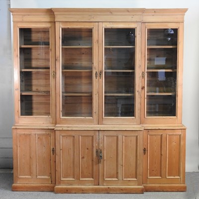 Lot 406 - An antique pine bookcase