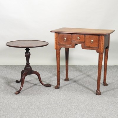 Lot 616 - A lowboy and a table