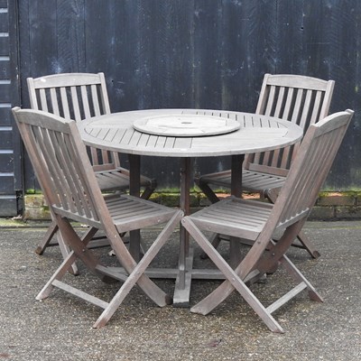 Lot 30 - A teak garden table